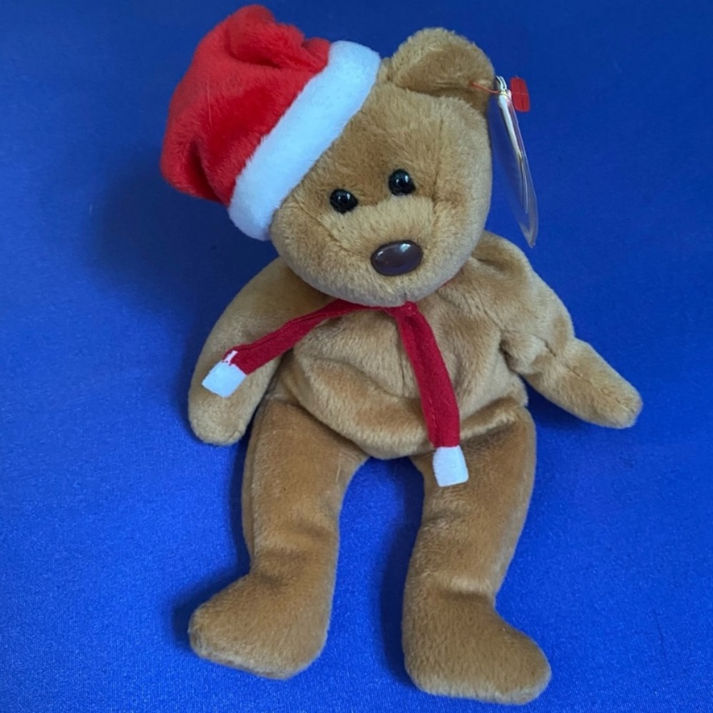 TY Beanie Babies 1997 Teddy with Santa Hat
Excellent condition.